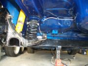 Rear axle fitted with spring and Spax shock
